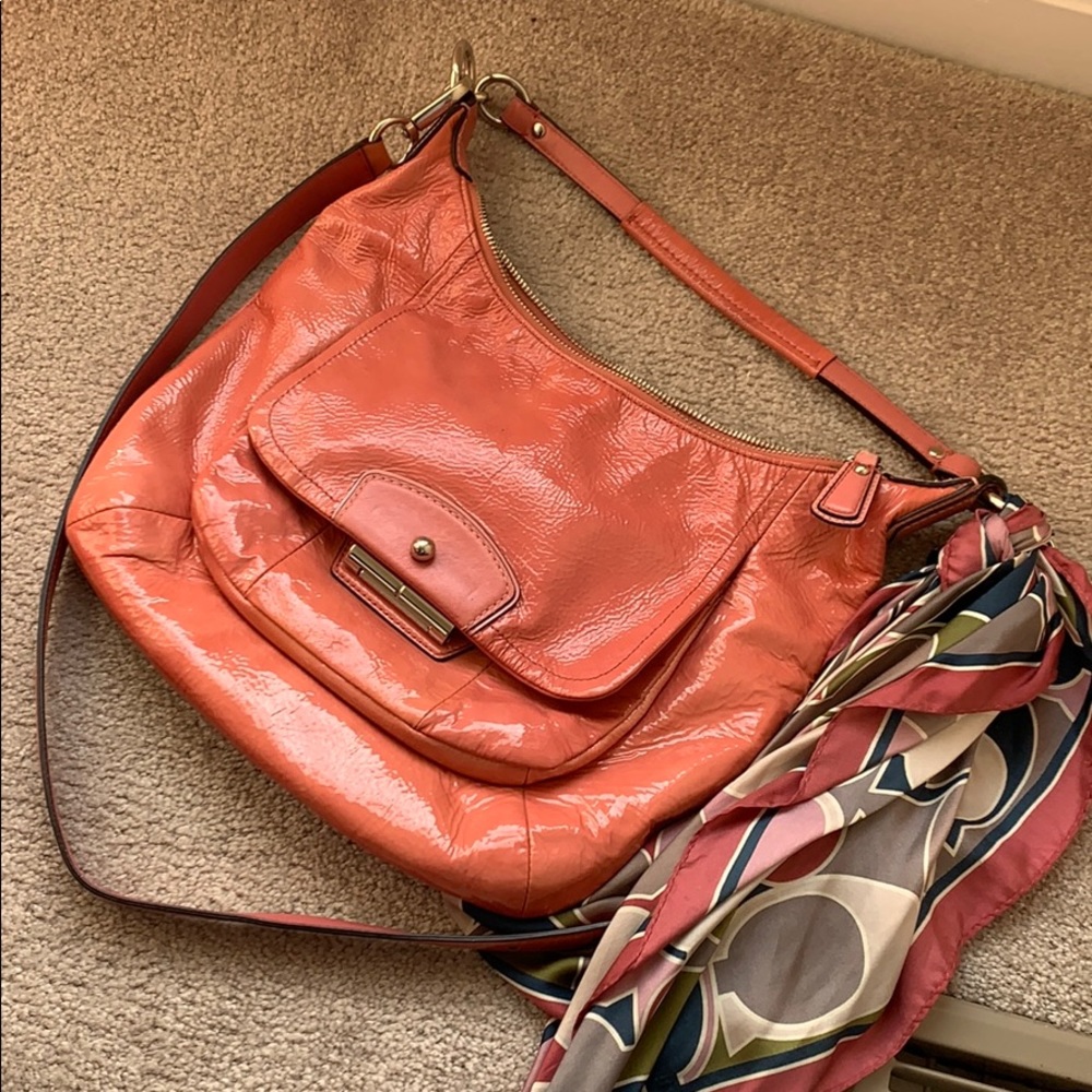 Pink coach purse with coach bag scarf
